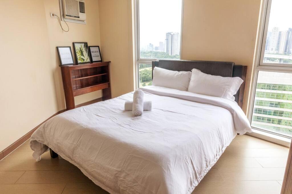 Cozy 2-Bedroom In The Venice Luxury Residences Manila Exterior photo